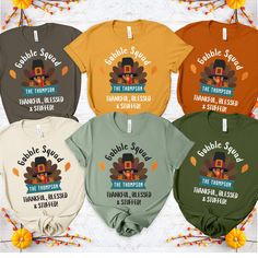 CREATE UNFORGETTABLE THANKSGIVING MEMORIES 🍂 with our personalized family shirts! ✨ About: Personalized Thanksgiving Shirts for Families Unique "Gobble Squad - Thankful, Blessed & Stuffed" design with custom family name. Perfect for Thanksgiving dinner, family gatherings, and memorable photos. High-quality prints on super comfortable shirts and sweatshirts. 👉 PREMIUM QUALITY OPTIONS: Bella Canvas: Soft, stylish t-shirt with a modern fit. 👕 PRODUCT DETAILS: Sizes: S-2XL. Styles: T-shirt, Long Thanksgiving Memories, Family Thanksgiving Shirts, Dinner Family, Turkey Thanksgiving, Family Thanksgiving, Funny Family, Squad Shirt, Thanksgiving Shirt, Family Humor