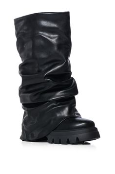 We found your sole-mate! The AZALEA WANG Mate Black Ruched Boot features a luxe faux leather upper, a scrunched foldover mid calf-height shaft, and a chunky covered flatform sole. Complete with a rounded toe and pull-on fit. (All measurements approximate from size 7.5): - Faux Leather Upper - Mid Calf-Height Shaft - Rounded Toe - Flatform Sole - 12” Shaft Height - 17" Calf Circumference - 2.5” Heel Height - Imported Product ID: 365340 Black Chunky Boots, Studded Combat Boots, Leather Knee Boots, Slouchy Boots, Azalea Wang, Weather Boots, Faux Leather Boots, Shoe Bags, Rhinestone Heels