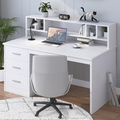 a white desk with a laptop on it and some plants in the corner next to it