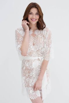 Swan Queen Bridal lace robe in Ivory - style 102SH Feminine Lace Wedding Robe, Feminine Lace Robe For Wedding Night, Feminine Lace Gown With Delicate Details, Elegant Lace Bride's Robe, Lace Wedding Night Gown With Lace Back, Elegant Lace Bridal Robe, Feminine Lace With Lace Closure For Wedding, Lace Back Gown For Wedding Night, Delicate Lace Robe For Wedding Night