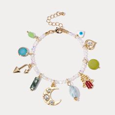 Capture the essence of summer with this unique Evil Eye Colorful Beaded Bracelet! Featuring a combination of multi-colored elements and a shining evil-eye, it is perfect for those who believe in the power of good luck. Adorable and pastel, this bracelet is a must-have for warding off misfortune and bringing a touch of the sea to your style. DETAILS Plating: 18K Gold Materials: 18K Gold on Brass, Natural Stones, Glass Beads Measurements: Length: 7.48"(19cm) + Extender: 1.96"(5cm) Weight: 15g Bohemian Multicolor Metal Charm Bracelet, Bohemian Style Multicolor Metal Charm Bracelet, Bohemian Evil Eye Bracelet With Colorful Beads, Spiritual Crystal Bracelet With Colorful Beads For Festivals, Bohemian Beaded Metal Charm Bracelet, Bohemian Multicolor Beaded Evil Eye Bracelet, Bohemian Style Multicolor Beaded Evil Eye Bracelet, Bohemian Evil Eye Jewelry For Party, Bohemian Charm Bracelets For Festivals