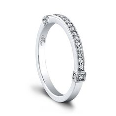 a white gold wedding band with diamonds