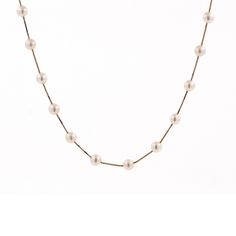 "This is a graceful Freshwater Pearl Necklace, Evenly Spaced on a 14K Yellow Gold Box Chain. The Necklace measures 17.25\" in Length. The Necklace features 23 Round Shaped Freshwater Pearls, measuring 5.50 mm each. The Necklace is secured with a Spring Ring Clasp, for a secure, worry-free wear. This stunning piece of Fine Vintage Estate Jewelry is being offered here for an unbeatable WHOLESALE price! Graceful & Elegant! A Timeless Classic! Metal: 14K Yellow Gold Hallmark: \"14K\" Box Chain Lengt Classic Box Chain Necklaces For Wedding, Classic Wedding Necklaces With Box Chain, Formal White Necklace With Box Chain, Classic Wedding Box Chain Necklaces, Gold Box, Freshwater Pearl Necklace, Classic Metal, Wedding Jewellery Necklace, Freshwater Pearl Necklaces