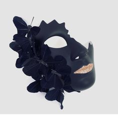 Step into a world of intrigue and allure with our enchanting women's black masquerade mask featuring a cracked half-face and delicate black butterflies and shimmering lips. This mask combines elegance with a touch of edginess, allowing you to captivate attention and leave a lasting impression.


Age Group/Gender - Adult/Unisex

Size/Type - One size fits all adults

Mask Color - Black

Mask Material - Polyresin

Special Features - Butterflies Elegant Black Formal Mask, Elegant Black Mask For Costume Party, Elegant Black Masquerade Mask For Halloween, Black Formal Eye Mask, Formal Black Eye Mask, Black Venetian Masquerade Mask For Party, Elegant Black Masks For Carnival, Black Formal Eye Mask Masquerade, Black Masks And Prosthetics For Carnival Evening