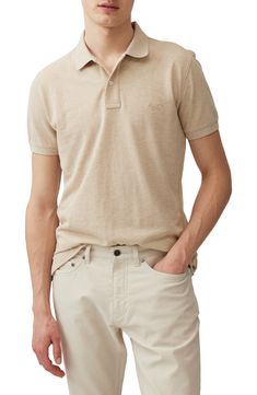 Simple, classic and endlessly versatile, this cool cotton-piqué polo sports the brand's logo embroidered in subtle tonal threads on the chest. 28" length (size Medium) Button half placket Spread collar Short sleeves 100% cotton Machine wash, line dry Imported Classic Beige Polo Shirt With Ribbed Collar, Classic Beige Polo Shirt With Collared Neckline, Classic Beige Collared Polo Shirt, Classic Beige Polo Shirt, Solid Polo Shirt With Button Closure For Spring, Solid Spring Polo Shirt With Button Closure, Fitted Casual Polo Shirt With Embroidered Logo, Classic Solid-color Everyday Polo Shirt, Beige Polo Shirt With Button Closure