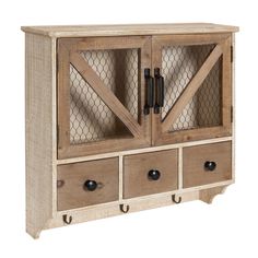 an old wooden cabinet with drawers and chicken wire on the doors is isolated against a white background