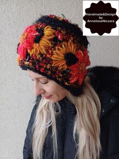 The color of the hat is black mixt red , ocher and yellow. Hand embroidered red and ocher flowers. Hat fits for a head circumference of - 56-58 cm / 22,04 - 22,83 " The color of the product in the photo may differ from the real one due to the color settings of your monitor. Recommendations for care: gentle hand washing at temperatures up to 30 degrees or cold , drying on a large cup. Thank you for visiting my store  Have a great day! Handmade Yellow Crochet Hat For Winter, Red Knitted Hat For Fall, Red Winter Hats For Gifts, Winter Festival Mini Hats One Size, Red Winter Hat As A Gift, Hand Knitted Hat For Winter Gift, Winter Festival Beanie Mini Hat, Handmade Black Mini Hats For Winter, Winter Embroidered Hat As Gift