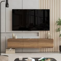 a living room with a large flat screen tv mounted to the side of a wall