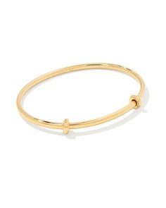 A minimalist and elevated charm base featuring two removable spacers for maximum versatility. Designed to capture your favorite charms, the Charm Bangle Bracelet in 18k Gold Vermeil is an essential for anyone with a growing charm collection or interested in adding some personality to their stack. 

 Please note: Additional charm spacers are sold separately. Charm Collection, Bar Jewelry, Bangle Bracelets With Charms, Demi Fine Jewelry, Initial Jewelry, Silver Prices, Engraved Jewelry, Charm Bangle, Gold Price