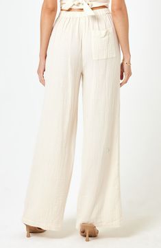 Take a break from the surf and relax in breezy cotton-gauze pants designed with a comfortable high waist and wide-leg silhouette. 31 1/2" inseam; 13" leg opening; 11 3/4" front rise; 15 1/2" back rise (size Small) Partial elastic waist Back patch pocket 100% cotton Hand wash, dry flat