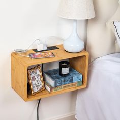 PRICES MAY VARY. Space-saving wall-mounted design: Our floating nightstand attaches securely to the wall, providing a functional and stylish solution for small bedrooms or limited space. A nightstand is a versatile and essential piece of furniture for any bedroom. It provides a convenient surface for keeping items you need close at hand, like a lamp, alarm clock, books, or a glass of water. Nightstands come in various styles, from sleek and modern to rustic and traditional, allowing you to find the perfect match for your decor. With drawers or shelves, they offer ample storage space for keeping your bedside essentials organized and within reach. Crafted from high-quality materials like wood, metal, or a combination, a well-designed nightstand not only serves a practical purpose but also ad Space Saving Bedside Table Ideas, Floating Nightstand Bedroom Ideas, Bedside Table Wall Mounted, Diy Bedside Shelf, Space Saving Nightstand Ideas, No Nightstand Ideas, Floating Bedside Table Ideas, Toddler Nightstand, Small Bed Side Table Ideas