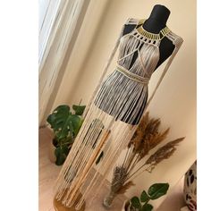 "Title: Macrame Dress-Long Fringe Costume-Boho Chic-Hippie Bride-Beach wedding-Festival Fashion-Burning Man-Bridesmaid Rope Dress AB-34/36/38/40/42/44/46/48 US-XS/S/M/L/XL IMPORTANT NOTICE/SPECIAL REQUEST🤗🤗 Standard sizes may vary by country and state. 👉Please share your size and height in your order note and in the \"personalization\" section. So I can knit dresses that are more perfect and fit your body. 👉Please do not forget to add your phone number in order not to be affected by the dela Festival Floor-length Maxi Dress With Tassels, Fitted Maxi Length Beach Party Dress, Floor-length Beach Party Dress, White Party Dress For Festivals, Beige Long Maxi Dress For Party, White Party Festival Dresses, Fitted Boho Dress For Spring Party, Hippie Fitted Beach Cover-up Dress, Spring Party Fitted Boho Dress