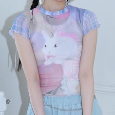 Harajuku Kawaii Aesthetic Pastel Y2K Bunny Print Mesh Tshirt Measurements S Bust: 74cm/29.1" Length: 44cm/17.3" M Bust: 78cm/30.7" Length: 45cm/17.7" L Bust: 82cm/32.2" Length: 46cm/18.1" *This product is see-through. We recommend layering another top underneath. *Standard shipping time to the US is 9-19 business days. Please consult our shipping page for shipping time estimates for other countries. *Please check the measurements/size chart very carefully when ordering from The Kawaii Factory. M Spring Anime Print Short Sleeve T-shirt, Fitted Harajuku Style Summer Tops, Kawaii T-shirt For Spring Streetwear, Y2k Printed Crew Neck T-shirt, Kawaii Anime Print T-shirt For Summer, Y2k Anime Print Summer Tops, Y2k Style Anime Print Tops For Spring, Spring Y2k Anime Print Tops, Y2k Anime Print Short Sleeve Top