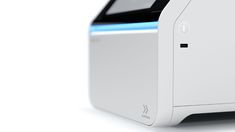 an image of a computer that is white and blue on the front, side view