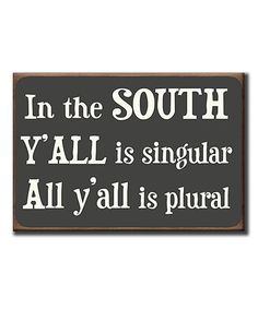 a sign that says in the south y'all is singular all y'all is plural