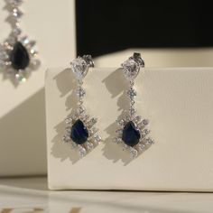 ✨💎 It gives you beautiful, attractive and outstanding jewelry experience ✨ • Everlasting Confidence • Wonderful Quality • Stay Shiny • Exquisite Fit • Over 17,000 cumulative user reviews, rating 4.8+/5 • Free Shipping & Returns Sapphire Splendor: Royal Blue Gemstone Jewelry Set Embrace the Majesty of Deep Blue Elegance Step into a world of regal beauty with our Royal Blue Gemstone Jewelry Set. This exquisite collection, featuring Platinum Plated Sterling Silver Dangle Earrings and a Pendant Cha Luxury Blue Pear-shaped Earrings, Elegant Pear-shaped Blue Jewelry, Elegant Blue Pear-shaped Jewelry, Formal Blue Crystal Earrings, Blue Cubic Zirconia Earrings With Elegant Design, Elegant Blue Cubic Zirconia Earrings, Blue Elegant Design Earrings For Anniversary, Blue Drop Bridal Earrings For Formal Events, Blue Drop Bridal Earrings For Formal Occasions