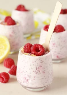 raspberry chia pudding in a glass with a spoon