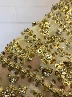 "Vintage 1970s Harvey Berin beige/gold beaded rhinestone semi sheer paisley brocade gown with zip closure up the back and zip up sleeves at wrist MEASUREMENTS: Chest: 36\" Waist: 29\" Length: 59\" Sleeve: 28.5\" All measurements taken with garment laid flat. Modern Size Estimate: S/M CONDITION: Excellent Vintage Condition- general wear with age, some missing beads/rhinestones and fraying All items at Time Warp are vintage, so there is some wear. They may not be 100% free of minor defects, as the Embellished Brocade Party Dress, Party Embellished Brocade Dress, Gold Sequined Silk Dress, Brocade Embellished Party Dress, Gold Silk Dress With Sequins, Party Brocade Embellished Dresses, Embellished Brocade Dresses For Party, Glamorous Gold Dress With Zari Work, Bollywood Style Gold Sequin Dress