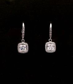 Tarnish resistant rhodium silver plated metal framed square princess cut AAA quality clear white cubic zirconia drop with rhodium sterling silver lever back hoop earrings decorated with cubic zirconia. Matching necklace and bracelet available and sold separately.  https://www.etsy.com/listing/532815570/wedding-jewelry-bridesmaid-bridal?ref=shop_home_active_2 Size: 2.5cm x 0.9cm Returns and exchange details   Customer Satisfaction Guarantee: Below policy will replace standard ETSY policy- please Elegant Square Cut Cubic Zirconia Earrings, Rectangular Fine Jewelry Earrings For Wedding, Square Cut White Gold Earrings For Wedding, Elegant Rectangular Diamond Earrings For Wedding, Rectangular White Gold Earrings For Wedding, Square Cut Fine Jewelry Earrings For Wedding, White Gold Rectangular Earrings For Wedding, Wedding Diamond White Rectangular Earrings, Classic Square Cut Earrings For Wedding