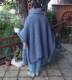 Gray Chunky Knit Poncho, Oversized Knit Sweater, Poncho Sweater Long Giant handmade knitted cardigan-poncho. This chunky knit poncho- cardigan is oversized, very soft, super warm . As it is oversized you can wrap yourself in it like in a blanket and feel cozy, stay warm and look awesome and stylish. Match it with different clothes, shoes as well as textures and enjoy every outfit! Fully handmade. The poncho can be worn on both sides so you have two different knits. On cold winter days, you can u Oversized Knitted Winter Cape, Oversized Knit Poncho With Batwing Sleeves, Winter Knitted Poncho Cape, Winter Knitted Cape Poncho, Knitted Winter Cape Poncho, Knit Poncho With Batwing Sleeves, Winter Shawl Knitting Pattern One Size, Cozy Oversized Acrylic Knitting Pattern, Oversized Cozy Acrylic Knitting Pattern