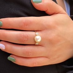 Pearl Engagement Gold ring, Solid 14k Gold ring. This handmade Gold ring with Pearl is made of 14K genuine gold and set with Natural Pearl. This Stunning Ring is set with Best AAA+ Quality Natural Pearl set in 14k Yellow Gold. High end finish. This 14k Gold ring can serve as an engagement ring or a birthday gift. All colors at the picture are available. * Gemstone -8mm Round Natural Pearl. * Metal - 14K genuine gold - White or Rose Gold are also available . * Ring - please select your size. * Be Classic Open Ring Jewelry With Halo Setting, Pearl Promise Ring With Halo Setting, Classic 14k Gold Pearl Ring With Open Design, Classic 14k Gold Pearl Open Ring, Fine Jewelry Yellow Gold Cluster Ring With Bezel Setting, 14k Gold Pearl Ring With Center Stone For Wedding, Elegant Round Halo Ring With Bezel Setting, Gold Pearl Ring With Halo Setting For Gift, Gold Pearl Ring Stamped 14k For Gift