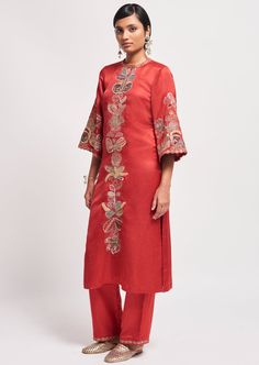 Rust red applique embellised linen satin straight kurta, pant & tulle dupatta. Red Chanderi Sharara With Floral Embroidery, Festive Red Kurta With Floral Embroidery, Festive Embroidered Tissue Silk Palazzo Set, Embroidered Silk Palazzo Set For Festive Season, Red Floral Embroidered Palazzo Set For Festivals, Red Floral Embroidery Palazzo Set For Festivals, Elegant Slub Silk Sharara For Celebration, Bollywood Style Red Palazzo Set With Embroidered Border, Red Bollywood Palazzo Set With Embroidered Border