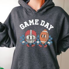 Football Game Day Sweatshirt, T-Mom Hoodie, Football Shirt For Women, Sports Mom Shirt, Mothers Day Gift, Family Footbal Shirt 🎁 Welcome to FB Apparel Co! We want to provide you with a delightful shopping experience, and we're here to assist you every step of the way. 🔍 Prior to finalizing your purchase, we recommend examining the images closely to ensure the size, color, and theme align with your preferences. Your satisfaction is our priority! 👕 Personalize your shirt effortlessly by selecting your preferred size and color from the easy-to-use menus. In the provided box, kindly specify your desired design color, referring to the available colors in the listing photos. 🔢 Need multiple shirts? No problem! Choose the quantity you desire and conveniently add them to your cart. Once you're Game Day Sweatshirt, Sports Mom Shirts, Mom Hoodies, Sports Mom, Women Sports, Football Game, Football Games, Shirt For Women, Football Shirt