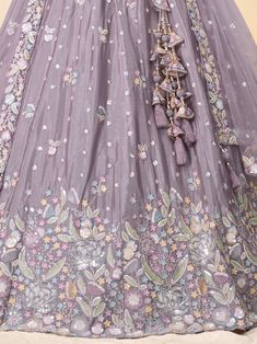 Introducing our amazing mauve sequins chiffon bridesmaid lehenga choli with dupatta, a stunning outfit that is sure to turn heads at any event. This beautiful mauve lehenga is crafted from high-quality chiffon fabric and features intricate sequin and coding thread embroidery work that adds a touch of elegance and sophistication to the ensemble.
The set includes a chiffon lehenga with a 3.0-meter flair, a matching choli, and a net dupatta with a sequin work ethnic motif and embroidery cut work bo Lavender Anarkali Set With Zari Work For Wedding, Anarkali Lavender Sharara For Reception, Lavender Sharara With Sheer Dupatta For Wedding, Lavender Traditional Wear With Dupatta For Wedding, Lavender Wedding Sharara With Sheer Dupatta, Wedding Lavender Sharara With Sheer Dupatta, Purple Georgette Dress With Sequins, Lavender Floor-length Anarkali Set For Wedding, Purple Sequined Georgette Dress