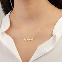 Introducing our Personalized Jewelry, Gold Name Necklace--a stunning expression of your unique style. Crafted with care, this exquisite piece features your chosen name in lustrous gold. The perfect accessory to showcase your individuality and sentimentality. Whether a thoughtful gift or a cherished keepsake, this necklace exudes elegance and lasting beauty. The adjustable chain ensures a comfortable fit for all. Embrace the personal touch and carry your name close to your heart with this meaning Custom Name Gold Necklace For Gift, Customizable Gold Necklace For Birthday, Gold Nameplate Charm Necklace For Birthday, Custom Gold Name Necklace For Valentine's Day, Custom Gold Necklace With Name For Valentine's Day, Gold Pendant Name Necklace For Birthday, Gold Nameplate Necklace For Birthday, Gold Necklace With Names For Birthday, Gold Name Necklaces For Anniversary