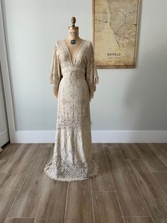 a dress on display in front of a map