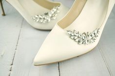 "Details: This listing is for 1 PAIR of Rhinestones clips ONLY.  Measurements approx 2\" x 2\" Silk Pump Shoes are available for purchase through this listing https://www.etsy.com/au/WhitejasmineBridal/listing/815005683/elegant-silk-satin-pump-wedding-shoes?utm_source=Copy&utm_medium=ListingManager&utm_campaign=Share&utm_term=so.lmsm&share_time=1633869585555" Luxury Classic Wedding Shoes With Padded Heel, Luxury Cream Heels For Wedding, Luxury Cream Wedding Shoes With Round Toe, Luxury Cream Wedding Shoes, Luxury Elegant Wedding Shoe Clips, Elegant White Shoe Clips With Rhinestones, Elegant White Rhinestone Shoe Clips, Elegant Rhinestone Shoe Clips For Wedding, Juliet Cap