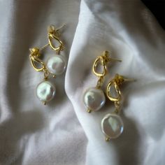 Looking for simple but gorgeous pearl earrings tonight your bridesmaids on your wedding day? These coin pearl drop earrings are simple, light and yet elegant! Perfect  gift for your bridesmaid or for anyone you care about!  Bundle to save more! One pair: $39.95 Two pairs: $59.95, $29.97 a pair Three pairs: $69.95, $23.32 a pair Will come with a pink sliding gift box with a pretty pink soft jewelry pouch free, ready for gift giving! You can't go wrong with this simple jewelry gifts for her! The c 14k Gold Filled Pearl Drop Earrings For Anniversary, Minimalist Pearl Pendant Earrings For Wedding, Minimalist Pearl Drop Earrings For Wedding, Minimalist Pearl Drop Bridal Earrings, Minimalist Pearl Drop Wedding Earrings, Minimalist Pearl Bridal Earrings With Matching Set, Minimalist Wedding Pearl Drop Earrings, Wedding Pearl Earrings With 14k Gold Filled Ear Wire, Elegant 14k Gold Filled Pearl Drop Earrings