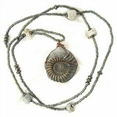 Unique Necklace Beaded With Glazed Gray Glass Beads And Ancient African Trade Beads With A Focal Pendant Of The Most Amazing Ammonite Millions Of Years Old, Fossilized In Pyrite And Stone. Necklace Is Approx 45" Long, Can Be Worn Long Or Layered. Fossil Is Approx 2" X 2". Handcrafted With Love By Me Ammonites Were Marine Animals That Existed During The Jurassic And Cretaceous Periods, And Are Related To Modern-Day Octopi, Squid And Cuttlefish. The Same Event That Wiped Out Dinosaurs Was The End Gray Beaded Necklace As Gift, Earthy Beaded Silver Jewelry, Silver Hand Wrapped Necklaces With Round Beads, Silver Necklaces With Hand Wrapped Round Beads, Gray Bohemian Necklace With Round Beads, Hand-strung Gray Jewelry For Gift, Gray Beaded Necklace For Gift, Hand-strung Gray Jewelry As Gift, Bohemian Gray Beaded Jewelry