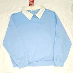 Light Blue Sweater With Collar. Drop Shoulder. Small. Sweater Is Very Lightweight 35% Cotton 65% Polyester. Blue Tops With Contrast Collar For Work, Blue Workwear Tops With Contrast Collar, White Long Sleeve Top With Contrast Collar, Blue Collared Tops With Contrast Collar, Trendy Blue Collar Tops, Casual Blue Collared Top, Casual White Sweatshirt For Work, Light Blue Turtleneck, Sweater With Collar