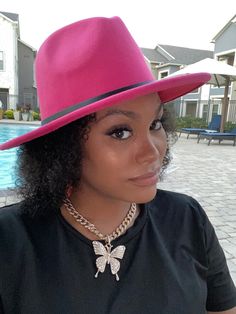 Accessorize any outfit with our most loved fashion fedora. Make heads turn in these. Chic Pink Fedora With Short Brim, Chic Pink Fedora With Flat Brim, Pink Fedora Hat For Fall, Pink Fedora For Party, Pink Wide Brim Fedora For Fall, Chic Pink Wide Brim Fedora, Adjustable Pink Fedora, Trendy Pink Fedora Hat, Trendy Pink Fedora With Short Brim