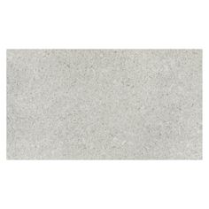 an image of a white marble tile textured with light gray speckles on the surface