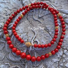 DESCRIPTION: Thank you for coming in! Beautiful rare Mediterranean Sardinia Coral with OX blood red color and sphere shape! The color is directly from the ocean, not dyed! 100% natural beauty! 28 inch necklace with 18k solid gold diamond spacers and clasp! Manufactured in Italy! 327 carats! You'll get the necklace you see! SIZE of the coral : Appr.7.5mm-11.5mm COLOR: OX Blood Red GRADE: AA Red Necklaces With Round Beads For Meditation, Red Spiritual Necklace With 108 Beads, Red Coral Jewelry With 8mm Beads, Red Polished Beads Necklace For Meditation, Red 8mm Beads Jewelry For Meditation, Luxury Red Coral Necklaces, Luxury Red Coral Round Bead Necklaces, Luxury Red Coral Round Beaded Necklace, Elegant Hand-strung Red Beaded Necklaces