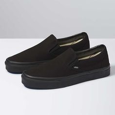 Vans | Classic Slip-On Black/Black Classics Shoe Urban Black Slip-on Skate Shoes, Black Slip-on Skate Shoes For Streetwear, Classic Black Skate Shoes With Round Toe, Black Skate Shoes With Rubber Heel Cap, Classic Black Slip-on Skate Shoes, Black Vans Sneakers With Rubber Sole, Classic Black Skate Shoes With Branded Insole, Black Casual Skate Shoes With Rubber Waffle Outsoles, Vans Black Skate Shoes With Rubber Waffle Outsoles