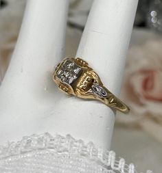 Two Tone Yellow & White Gold Diamond Antique Ring Size 6.75 This is a lovely estate find Art Deco Antique 14k white & yellow gold white diamond filigree ring. The ring is stamped 14k, and is 8mm NS and 4mm off the finger. The approximately 1.5mm full round white diamond has great shine. Notice the fine detailed geometric and floral filigree all the way around this beautiful ring. There is a small makers engraving of "sselton". This ring can be sized, please email for more info. This ring is in g Vintage Gold Diamond Ring With Accents, Victorian White Diamond Ring With Prong Setting, Heirloom White Diamond Marriage Ring, Victorian Gold Diamond Ring With Diamond Cut, Victorian White Diamond Ring With Diamond Cut, Victorian Yellow Gold Diamond Ring For Anniversary, Art Deco Gold Diamond Ring With Diamond Accents, Victorian Yellow Gold Diamond Anniversary Ring, Victorian White Diamond Cut Diamond Ring