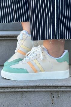 A simple sneaker with pastel colors and a comfortable fit. They are a low ankle sneaker with stripes and laces. Style with a jumpsuit or jeans for a casual look. Heel Height: 1.25" Green Lace-up Platform Sneakers For Spring, Spring Green Lace-up Platform Sneakers, Casual High-top Platform Sneakers With Elastic Laces, Multicolor Platform Sneakers For Spring, Green Platform Sneakers With Vulcanized Sole For Spring, Multicolor Spring Platform Sneakers With Laces, Casual Multicolor Platform Sneakers With Laces, Spring Multicolor Platform Sneakers With Laces, High-top Platform Sneakers With Elastic Laces For Spring