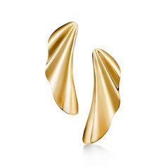 Inspired by the ebb and flow of the sea, this High Tide design emphasizes the simple beauty of nature. A graceful curve echoes rippling waves in these elegant earrings. Wear this dramatic pair for a bold look. 18k yellow gold; Original designs copyrighted by the Nando and Elsa Peretti Foundation | Elsa Peretti® High Tide Earrings in Yellow Gold, Size: Large Bridal Jewellery Earrings, Ebb And Flow, Gold Jewelry Earrings, Elsa Peretti, High Tide, Simple Beauty, Elegant Earrings, Tiffany & Co., Bridal Jewelry