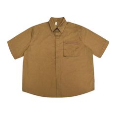 Indulge in the luxurious elegance of our Japanese Solid Color Pocket Shirt. Made with premium quality material and featuring a convenient pocket, this shirt combines style and functionality. Perfect for any occasion, you'll feel confident and sophisticated wherever you go. Elevate your wardrobe with this exquisite shirt. Brown Relaxed Fit Shirt For Work, Brown Tops With Casual Collar And Pockets, Brown Tops With Pockets And Casual Collar, Cotton Workwear Tops With Pockets, Relaxed Fit Short Sleeve Shirt With Pockets, Summer Short Sleeve Shirt With Side Pockets, Casual Workwear Tops With Sleeve Pocket, Relaxed Fit Shirt With Pockets And Spread Collar, Cotton Collared Shirt With Pockets