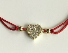 18k gold plated over 925 sterling silver heart red bracelet .adjustable . for love and happiness. --comes with free gift pouche. pulsera rojo de plata esterlina 925 con baño de oro corazon . ajustable. para amor y felicidad. --gratis bolsa de regalo. Red Bracelet, Red Rope, Heart Red, Red Bracelets, Cord Bracelet, Love And Happiness, Color Rojo, Sterling Silver Heart, Silver Heart