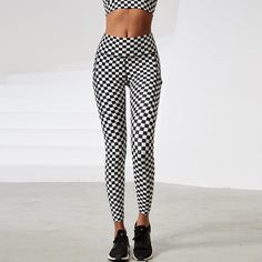 Checkered Leggings. A comfortable fit with a sporty look for workouts, yoga or just hanging out. Feel comfortable and look great. Detail: Quick Dry/BreathableDetail: Side & Back PocketsWaist Type: HighMaterial: (75%) Nylon, (25%) Spandex Trendy Full-length Sports Leggings, Trendy Compression Yoga Pants For Sports, Trendy Gym Leggings, Trendy Full Length Gym Leggings, Casual Full Length Workout Leggings, Casual Full Length Activewear For Workouts, Trendy Full-length Yoga Activewear, Trendy Full Length Yoga Activewear, Trendy Tight Sports Pants