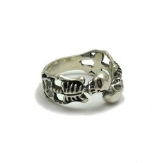 Sterling silver ring 925/1000, flower. Stamped 925.Approximate weight 5.5 grams. Top width 1.2 cm (0.48 inches). All our jewels are made from solid sterling silver 925/1000 and are carefully crafted by hand in our family workshop. We dispatch your orders in 5 working days, worldwide and the postage is $5. We ship registered priority mail. Please allow 5-7 working days for delivery in Europe and 10-15 working days outside Europe. For any questions - please do not hesitate to contact me! Symbolic Sterling Silver Rings Stamped 925, Unique Sterling Silver Rings For Formal Occasions, Unique Formal Sterling Silver Rings, Formal Silver Rings With Oxidized Finish, Formal Oxidized Silver Rings, Classic Sterling Silver Skull Ring With Polished Finish, Formal Sterling Silver Rings With Oxidized Finish, Engraved Sterling Silver Toe Ring, Nickel-free Metal Rings For Formal Occasions