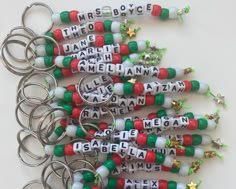 a bunch of key chains that have been made to look like christmas letters