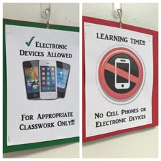 two signs hanging on the wall with instructions for cell phones and electronic devices attached to them