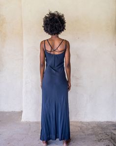 The IDIS Long slip dress is made from a light weight woven rayon. Designed with a scoop neck line and double strapes that drape nicely down the back, side splits to just below the knee and cut on the bias. These features create a dress that moves with you. Bringing you comfort and movability while maintaining a simple elegance. Our long slip looks great teamed with the Kimono Crop from the idis range for a layered effect. SIZE GUIDE XS: bust 76-82 cm | waist 64-70 cm | hips 78-84 cm S: bust 82-8 Slip Dress Long, Boho Summer Dress, Yoga Pants Men, Summer Dress Beach, Beach Dress Summer, Long Slip Dress, Festival Pants, Long Slip, Dress Slip