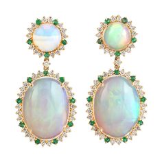 Cast in 14 karat gold. These earrings are hand set in 13.05 carats Ethiopian opal, .34 carats emerald, and .82 carats of sparkling diamonds. FOLLOW MEGHNA JEWELS storefront to view the latest collection & exclusive pieces. Meghna Jewels is proudly rated as a Top Seller on 1stDibs with 5 star customer reviews. All items manufactured by us are handmade and can be customized or redesigned. Composition Size-32X15 MM Total Weight-7.845 Gold Weight(Gms)-5.004 Diamond Wt(Cts)-0.82 Opal Wt(Cts)-13.05 Emerald Wt(Cts2)-0.34 Formal Opal Gemstone Earrings, Elegant Green Ethiopian Opal Jewelry, Oval Opal Earrings For Formal Occasions, Formal Oval Opal Earrings, Luxury Ethiopian Opal Formal Jewelry, Brooch Diamond, Vintage Drop Earrings, High Jewellery, Ring Earring