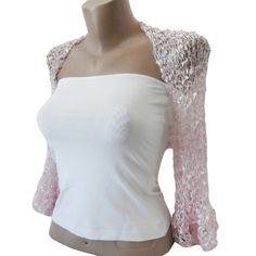 This Pale Pink Ruffle Sleeves Bolero is a perfect accessory for your summer outfit. It gives an elegant silky touch and is proper for the late spring and the summer months. Be the star at the dancing with this lightweight loose shrug. It matches perfectly with an evening dress as well over a party top.   This bolero is quite stretchy. Ask for a Custom order to fit exactly your size ot choose it according to the measures given below. It is available in Plus size also. Please contact us to send us Spring Party Lace Shrug, Fitted Crochet Shrug For Summer, Stretch Crochet Top For Spring Party, Bohemian Crochet Top For Spring Party, Elegant Crochet Top For Spring, Long Sleeve Summer Shrug For Party, Fitted Long Sleeve Crochet Party Top, Fitted Long Sleeve Crochet Top For Party, Elegant Crochet Top For Wedding